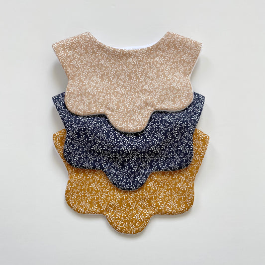 Choice of Autumn ditsy scallop bib